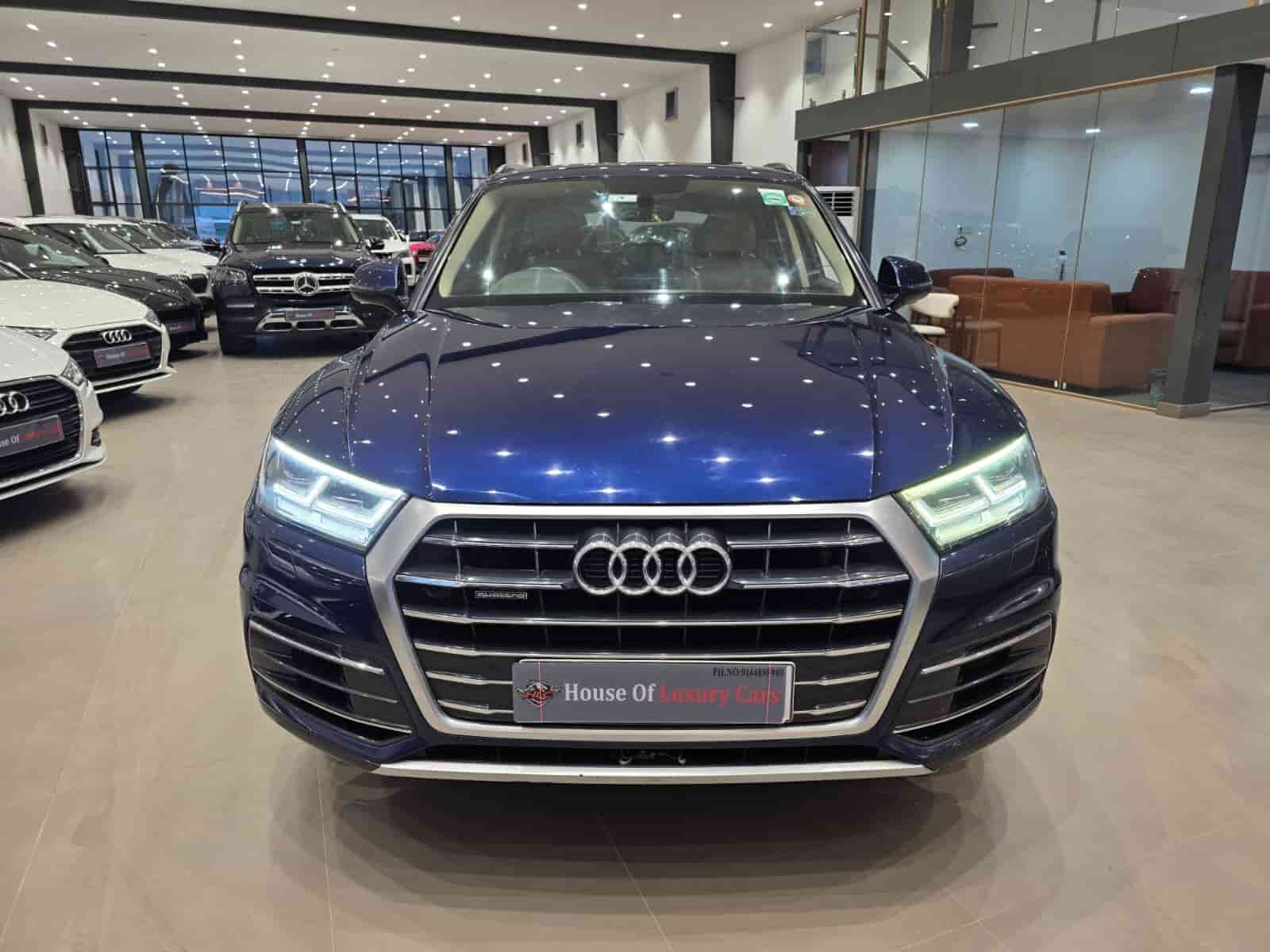 Audi Q5 45 TFSI in Navarra Blue on the HLC showroom floor